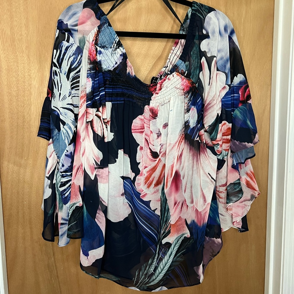 Floral off the shoulder flutter sleeve blouse